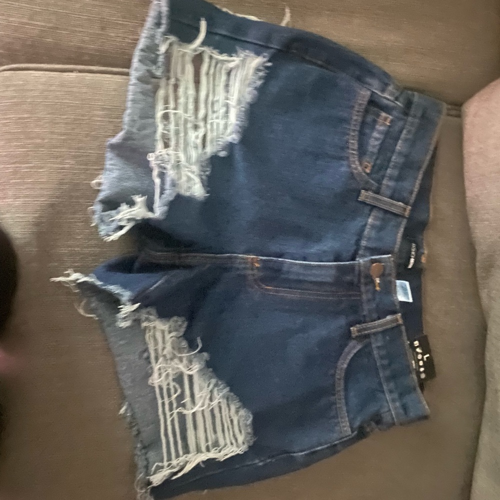 Fashionnova cut up shorts size Large. With tags, no stretch.